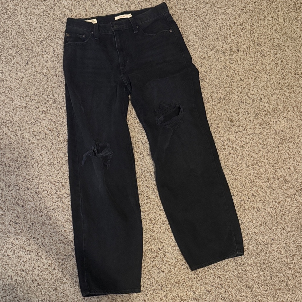 Levi’s premium baggy dad jean wide leg black with holes in knees.